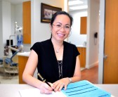 Jennifer Pham DDS at the desk