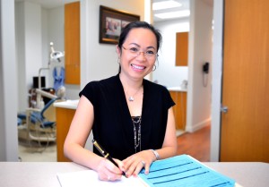 Jennifer Pham DDS at the desk